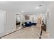 Bright and open living room with travertine floors, modern decor, and plenty of space at 2602 Winter Park Rd, Winter Park, FL 32789