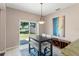 Cozy dining area with backyard views and stylish furnishings at 2644 Slagrove Ct, Winter Garden, FL 34787