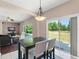 Open dining area offering natural light and seamless living space at 2644 Slagrove Ct, Winter Garden, FL 34787