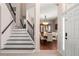 Elegant dining room featuring hardwood floors, wainscoting, and a large window at 2644 Slagrove Ct, Winter Garden, FL 34787