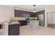 Modern kitchen featuring stainless steel appliances and granite countertops at 2644 Slagrove Ct, Winter Garden, FL 34787