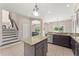 Well-equipped kitchen with granite counters, ample cabinets, and open layout at 2644 Slagrove Ct, Winter Garden, FL 34787