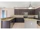 Stylish kitchen with stainless steel appliances and granite countertops at 2644 Slagrove Ct, Winter Garden, FL 34787