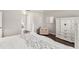 The main bedroom has a tray ceiling, hardwood floors, neutral paint, and a large dresser at 2644 Slagrove Ct, Winter Garden, FL 34787