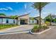 Beautiful building with stone accents, well-manicured landscaping, and a paver driveway at 3009 Penelope Loop, Kissimmee, FL 34746