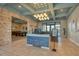 Lobby with reception desk, contemporary lighting, and a view of the game room at 3009 Penelope Loop, Kissimmee, FL 34746