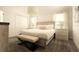 Bright main bedroom features a bed, white furniture and light decor creating a cozy atmosphere at 3009 Penelope Loop, Kissimmee, FL 34746