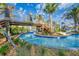 Lazy river featuring clear water, rock details, and a rope bridge in the community at 3009 Penelope Loop, Kissimmee, FL 34746