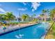 Lazy river featuring fountains and a playground with palm trees at 3009 Penelope Loop, Kissimmee, FL 34746