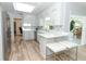Modern eat-in kitchen featuring skylight, breakfast bar, and stainless steel appliances at 3317 Dormer Ct, Winter Park, FL 32792