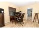 Home office setup with a desk, computer, and comfortable chair, perfect for remote work at 3317 Dormer Ct, Winter Park, FL 32792