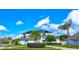 Bright and airy two-story home with solar panels, a well-maintained lawn, and mature landscaping at 3532 Amaca Cir, Orlando, FL 32837