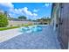 Beautiful backyard featuring a uniquely designed pool, spa, pergola, patio, and a fenced yard at 3532 Amaca Cir, Orlando, FL 32837