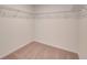 Walk-in closet with carpet and adjustable wire shelving at 3565 Dahlia Dr, Lake Hamilton, FL 33851