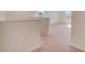 Upstairs hallway with carpet flooring and natural light from the windows at 3565 Dahlia Dr, Lake Hamilton, FL 33851