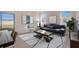 A cozy living room features a comfortable couch, stylish coffee table, and natural light at 3565 Dahlia Dr, Lake Hamilton, FL 33851