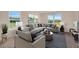 Bright living room with modern furniture, natural light, and a stylish decor at 3565 Dahlia Dr, Lake Hamilton, FL 33851