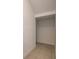 Tiled storage room with neutral walls and ceiling at 3565 Dahlia Dr, Lake Hamilton, FL 33851
