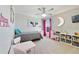 ' bedroom with a bed, playroom, moon decoration, and natural light at 3680 Ricky Ln, St Cloud, FL 34772