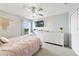 This bedroom features calming decor, lots of natural light, and carpet flooring at 3680 Ricky Ln, St Cloud, FL 34772