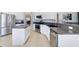 Kitchen with stainless steel appliances and adjacent dining area at 3680 Ricky Ln, St Cloud, FL 34772