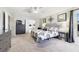 This main bedroom offers a cozy atmosphere with unique decor and plenty of natural light at 3680 Ricky Ln, St Cloud, FL 34772
