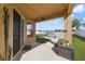 Covered patio overlooking a fenced backyard with an above-ground pool at 3680 Ricky Ln, St Cloud, FL 34772