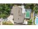 Aerial view of home with an enclosed pool and patio area at 4021 Hargill Dr, Orlando, FL 32806