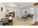 Cozy dining area with tiled floor and kitchen view at 4021 Hargill Dr, Orlando, FL 32806