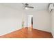 Main bedroom with wood floors, ensuite bathroom and hallway access at 4021 Hargill Dr, Orlando, FL 32806