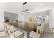 Dining room seamlessly connects to the living room and kitchen, perfect for entertaining and Gathering gatherings at 4065 Winderlakes Dr, Orlando, FL 32835