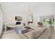 Spacious living room with a modern fireplace, contemporary furniture, and hardwood floors for a cozy atmosphere at 4065 Winderlakes Dr, Orlando, FL 32835
