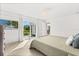 Bright bedroom with a sliding glass door, offering seamless access to the outdoor balcony at 4065 Winderlakes Dr, Orlando, FL 32835