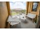 Relaxing balcony with outdoor seating overlooking the community and the sky at 419 Terrace Ridge Cir # 419, Davenport, FL 33896