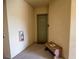 Condo entrance, door number 419 with a bench at 419 Terrace Ridge Cir # 419, Davenport, FL 33896