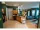 Eat-in kitchen and living space with wood cabinets at 419 Terrace Ridge Cir # 419, Davenport, FL 33896