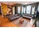 Living room area with two sofas and hardwood flooring at 419 Terrace Ridge Cir # 419, Davenport, FL 33896