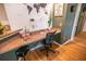 Home office with an ergonomic desk and chair at 419 Terrace Ridge Cir # 419, Davenport, FL 33896