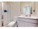 This bathroom features a shower, white vanity, and tiled floor at 4191 Holstein St, St Cloud, FL 34772
