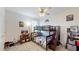 Bright bedroom featuring a bunk bed, ceiling fan, and decor at 4191 Holstein St, St Cloud, FL 34772