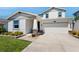 Attractive two-story home with a two-car garage and well-maintained front yard at 4191 Holstein St, St Cloud, FL 34772