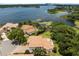 Stunning lakefront property boasting a private dock and expansive views of the tranquil waters at 4509 Patricia Ann Ct, Orlando, FL 32839