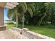 Enjoy the backyard view from the granite topped custom outdoor stone bar at 4509 Patricia Ann Ct, Orlando, FL 32839