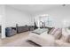 The primary suite features modern decor, sitting area, and arched entryway to an adjacent workout space at 4509 Patricia Ann Ct, Orlando, FL 32839