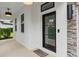 The beautiful front entrance leads guests to this home's stylish front door at 4509 Patricia Ann Ct, Orlando, FL 32839