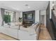 Comfortable living room with a fireplace and large sliding glass doors at 4509 Patricia Ann Ct, Orlando, FL 32839
