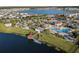 Aerial view of community amenities with pool, splashpad and lake at 4918 Windermere Ave, Kissimmee, FL 34746