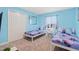 The bedroom features twin beds with 'Frozen' theme and a vanity with mirror at 4918 Windermere Ave, Kissimmee, FL 34746