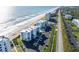 Beachfront condos with pool, parking, and easy beach access from an aerial view at 5301 S Atlantic Ave # 51, New Smyrna Beach, FL 32169