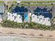 Aerial view showcasing the condo's beachfront location and community pool at 5301 S Atlantic Ave # 51, New Smyrna Beach, FL 32169